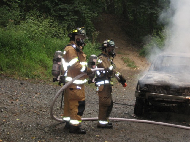 Lonz Brown and Bob Fraser on a car fire on Forge Road.